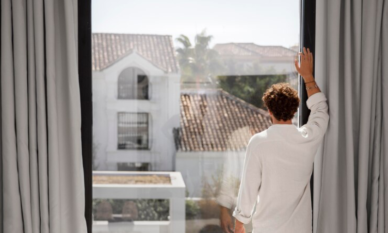 Close up on young man in luxury travel house